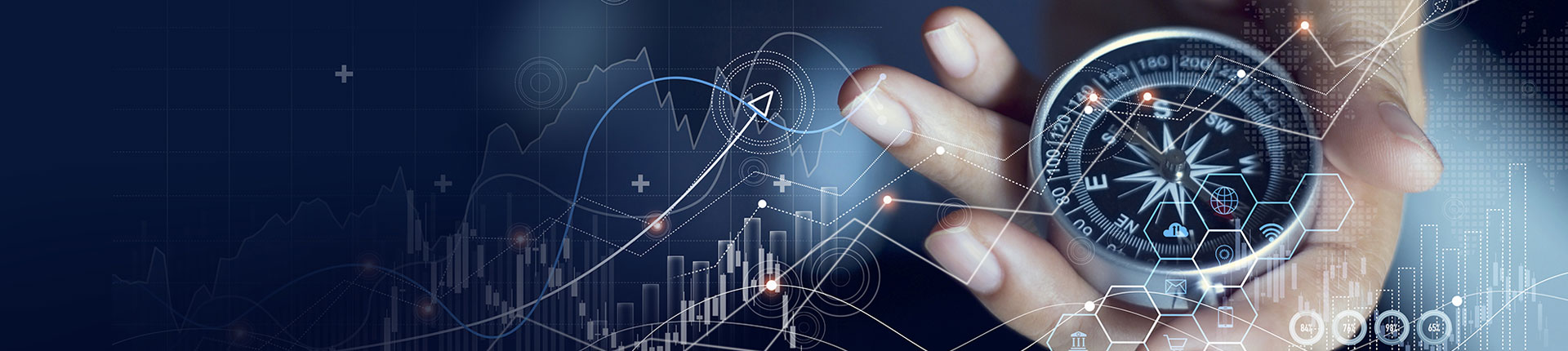 Hand holding a compass surrounded by graphs and numbers